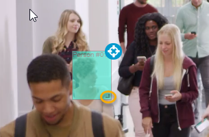 The mask window shown on a video with the corner used to expand the window highlighted.
