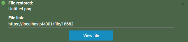 La fenêtre contextuelle Fichier restauré, avec un lien vers le fichier et une option permettant de l’afficher.